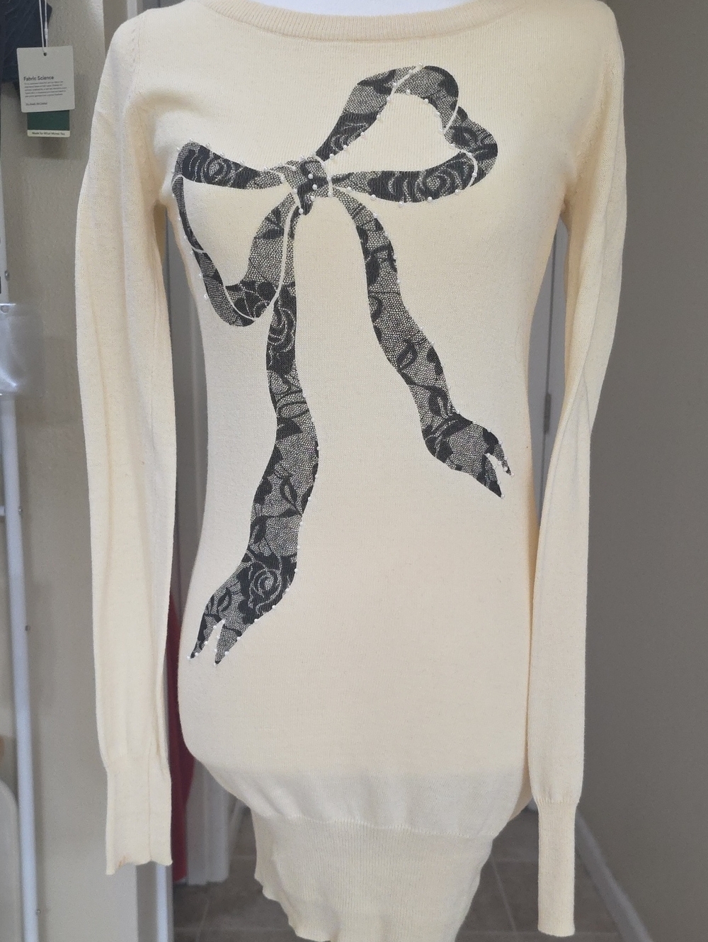 Cream Crewneck Sweater with Black Bow Motif